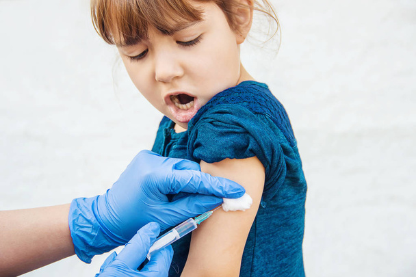 vaccination of children. An injection. Selective focus. - Photo, Image