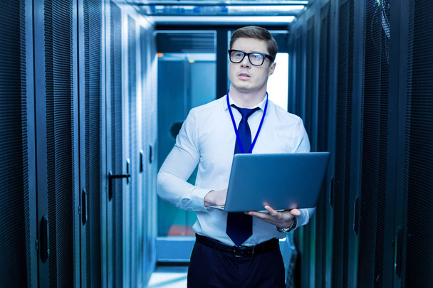Successful man working in a data center - Photo, Image