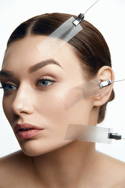 Beauty Woman Face During Face Skin Lift Treatment - Foto, imagen