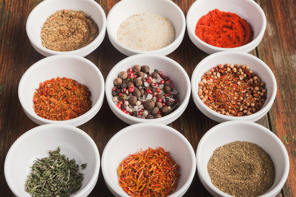 Diverse spices in small cups - Photo, Image