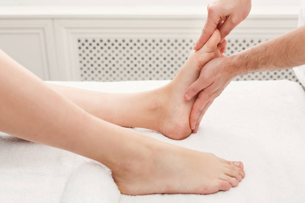 Feet massage closeup, acupressure - Фото, зображення