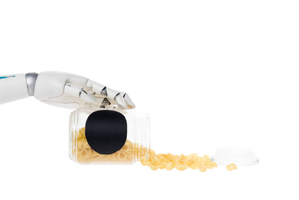 cropped shot of robot with macaroni spilled from jar isolated on white - Foto, Imagen