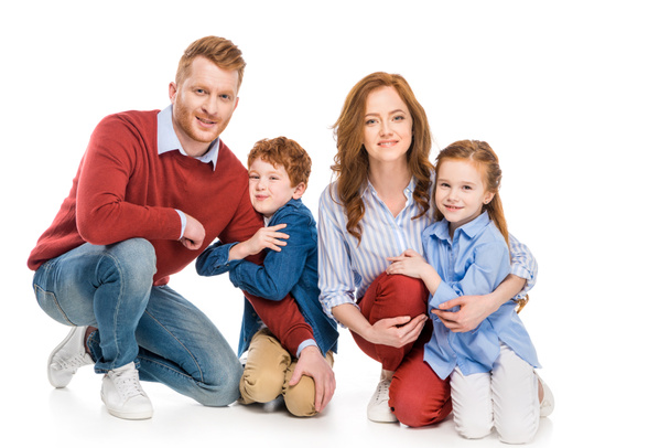 happy parents with adorable little kids smiling at camera isolated on white - Photo, Image