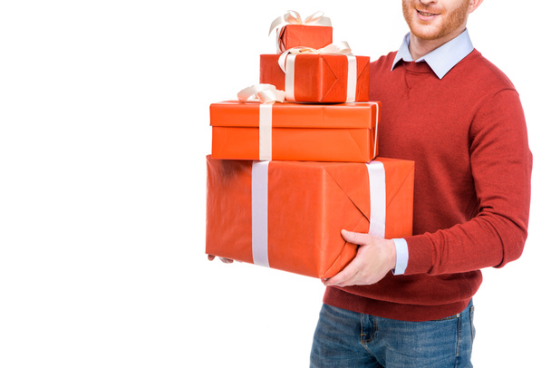 cropped shot of man holding gift boxes isolated on white - Fotó, kép