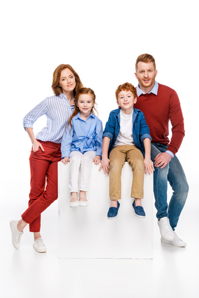 happy redhead family with two children smiling at camera isolated on white - Photo, Image