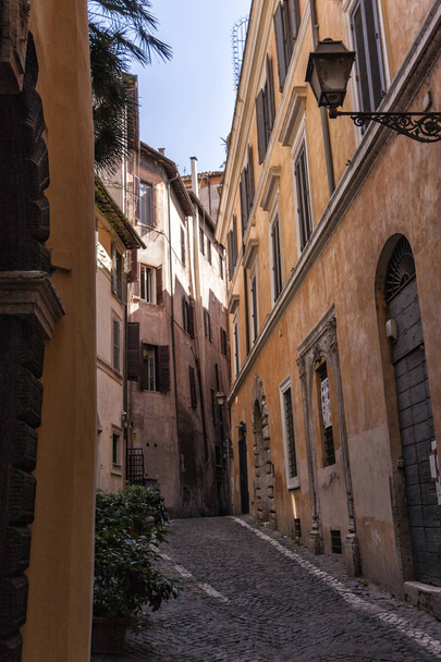 Typical old and narrow street in Rome, Italy - Photo, Image