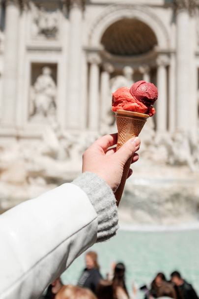 Italian street ice cream with cookies  in hand - Фото, изображение