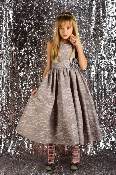 Little girl in fashionable dress, prom. little girl in glamour style. - Фото, изображение