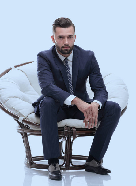 businessman sitting in a comfortable chair - Foto, afbeelding