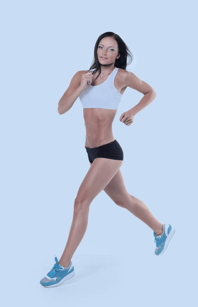 Donna attraente impegnata in esercizio aerobico
 - Foto, immagini