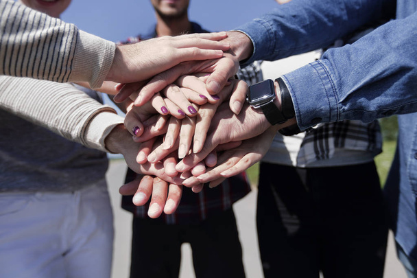 Hands of young people close up - Φωτογραφία, εικόνα