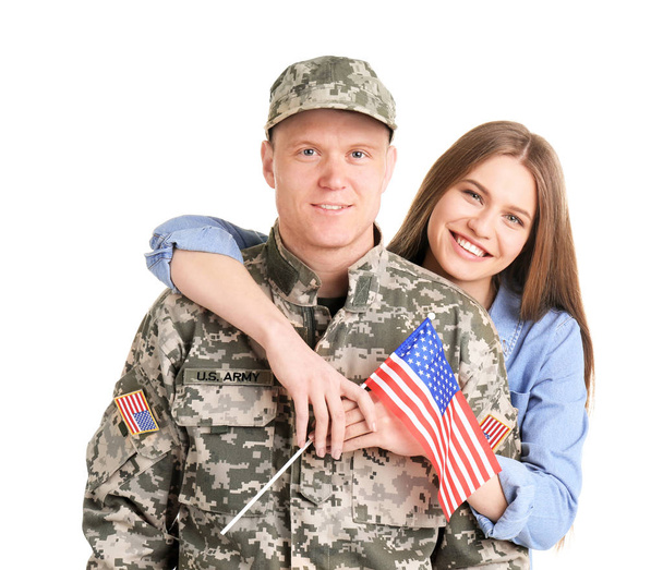 Male soldier with his wife on white background. Military service - Foto, Imagen