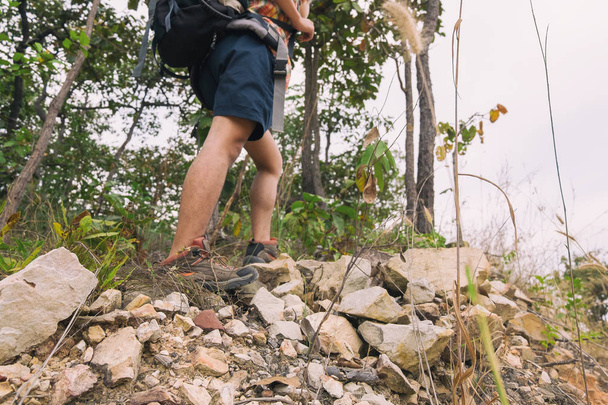 Young man trekker enjoy traveling with backpack, hiking concept, travel concept - Foto, imagen