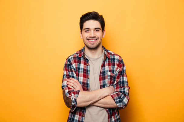 Portrait of a smiling young man standing - Fotografie, Obrázek