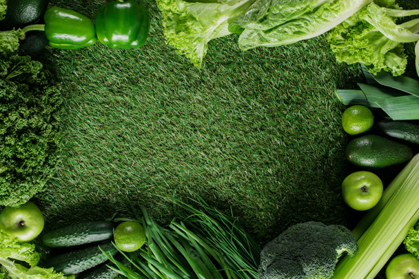 top view of green vegetables on grass, healthy eating concept - Photo, Image