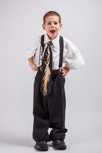 Boy wearing oversized clothes - Valokuva, kuva