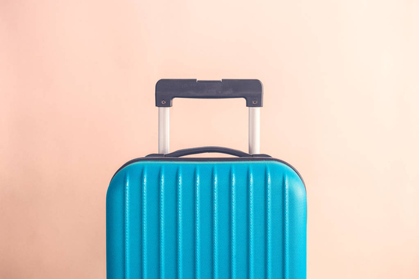 Luggage on beige background minimalistic vacation concept - Fotó, kép