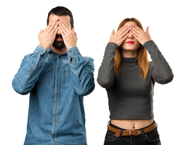 Man and woman covering their eyes - Valokuva, kuva