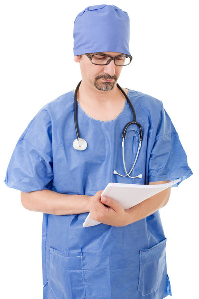 male doctor thinking with his notes, isolated - Fotó, kép