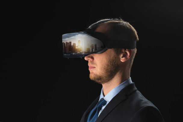 businessman in virtual reality glasses or headset - Foto, afbeelding