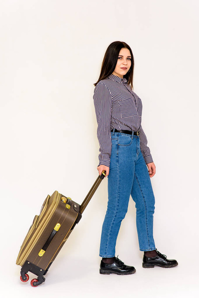 beautiful girl with travel bag on white background - Zdjęcie, obraz