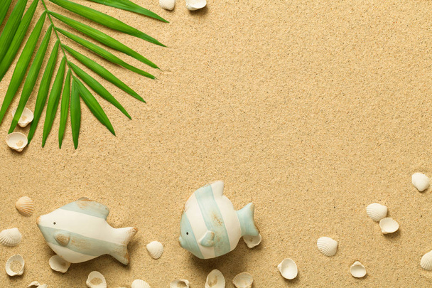 Summer Background with Green Palm Leaf, Fish and Shells - Фото, изображение