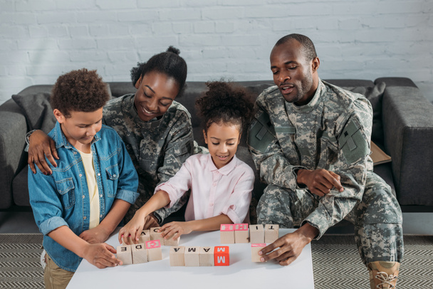 Army soldiers with happy kids playing words game - Zdjęcie, obraz