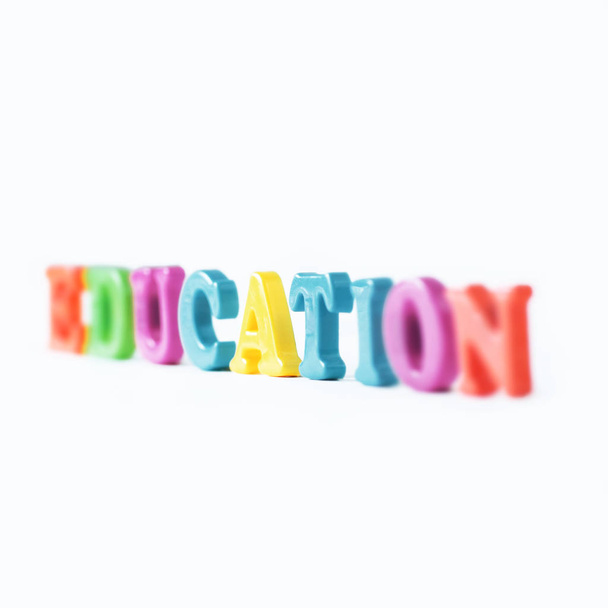 blurred image of the word formation on a light background .photo with copy space - Fotoğraf, Görsel