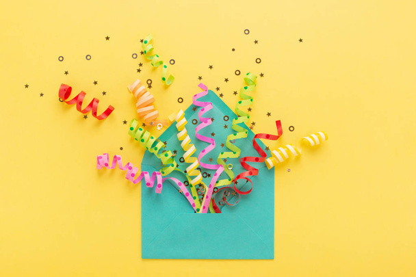 Colorful party confetti in envelope. - Photo, Image
