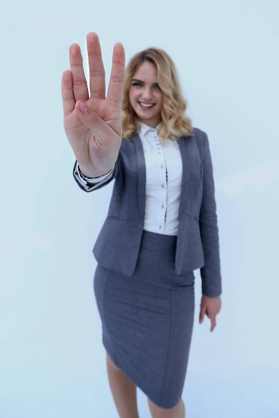 Smiling business woman showing stop sign to the camera - Фото, зображення