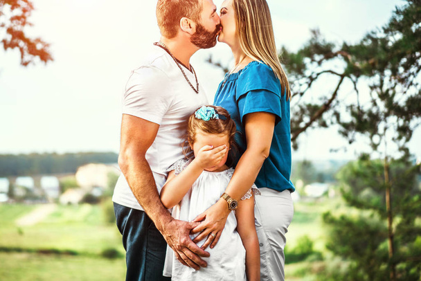 family with little daughter outdoors - Valokuva, kuva
