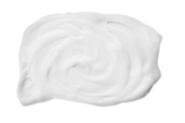Muestra de crema hidratante sobre fondo blanco
 - Foto, Imagen