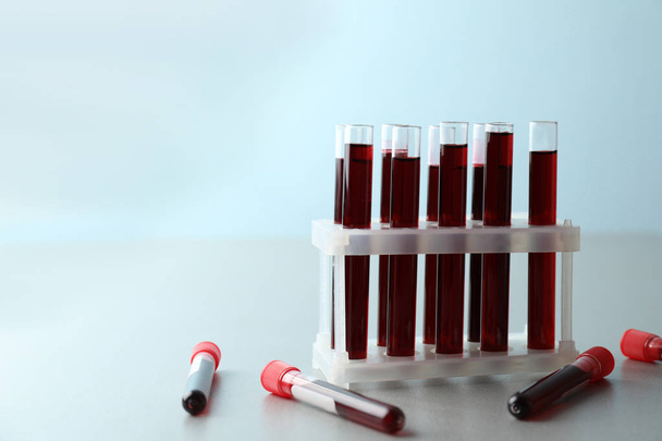 Test tubes with blood samples on table - Photo, Image