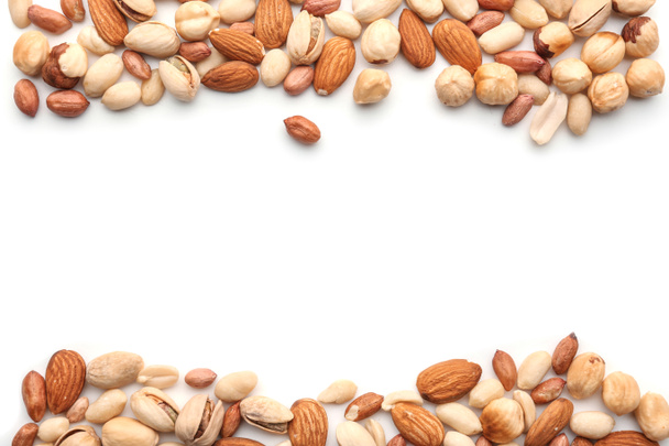 Different types of nuts on white background - Photo, Image