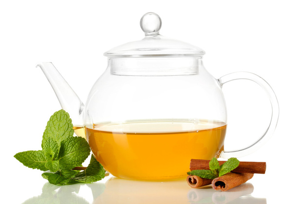 Teapot with mint and cinnamon isolated on white - Foto, immagini