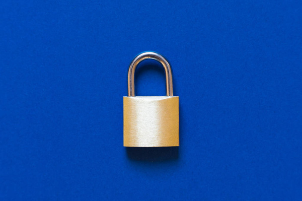 lock as symbol for Privacy and General Data Protection Regulation on blue background - Φωτογραφία, εικόνα