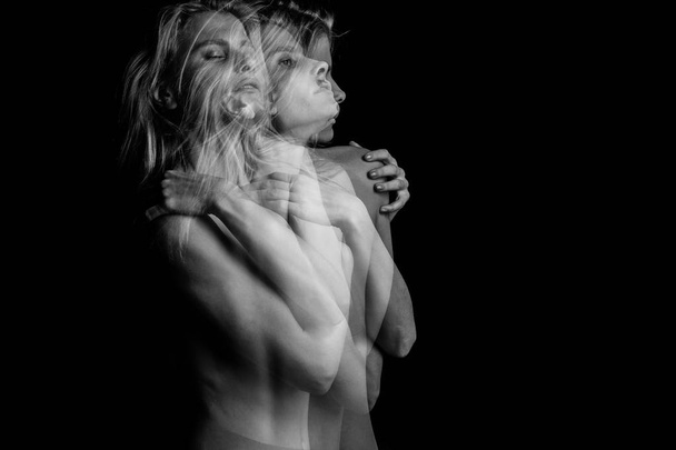 Creative portrait of young blonde woman holding herself. triple exposure. Black and white photo - Foto, Bild