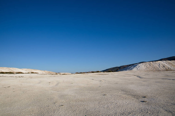 spectacular tranquil landscape with white rocks and limestone at sunny day, salda golu, turkey - Foto, imagen