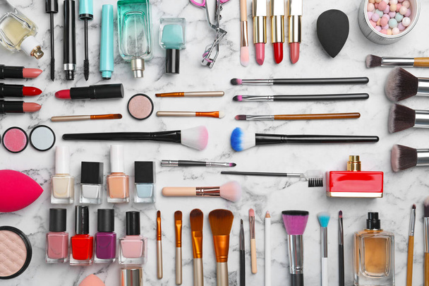 Flat lay composition with cosmetic products on marble background - Photo, image