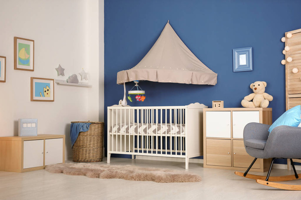 Stylish baby room interior with crib - Foto, Imagem