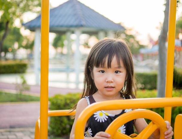 Happy kid, asian baby child playing on playground - Zdjęcie, obraz