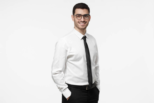 Yong business man or corporate employee isolated on grey background. Classical formal wear office style.  - Zdjęcie, obraz