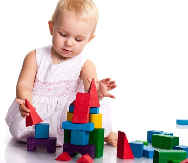 Beautiful baby building a castle - 写真・画像
