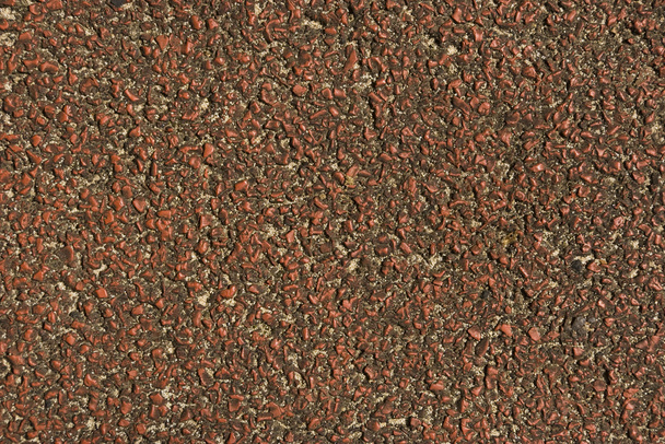 Softfall vermelho com areia
 - Foto, Imagem