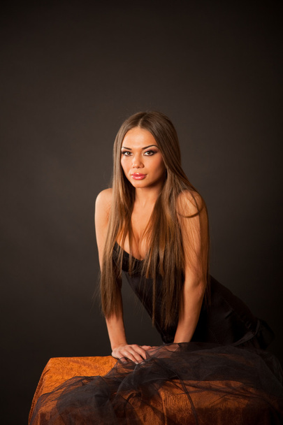 Attractive brunette girl with long hair - Valokuva, kuva
