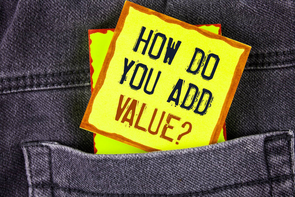 Text sign showing How Do You Add Value Question. Conceptual photo Bring business progress contribute earn written on Yellow Sticky Note Paper placed on the Jeans background. - Photo, Image