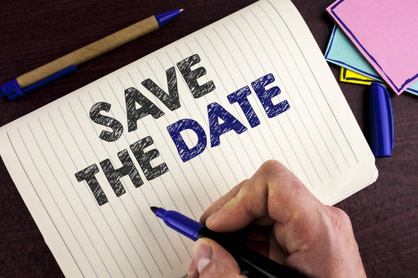 Conceptual hand writing showing Save The Date. Business photo showcasing Organizing events well make day special by event organizers written by Man on Notebook Book on wooden background Pen. - Photo, Image