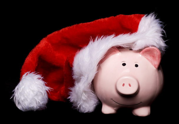 Santa hat piggy bank - Foto, afbeelding