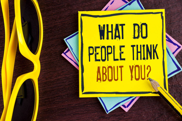 Text sign showing What Do People Think About You Question. Conceptual photo This is how others judge you written on Yellow Sticky note paper on wooden background Pencil Sun Glasses. - Photo, Image