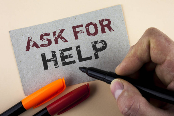 Conceptual hand writing showing Ask For Help. Business photo text Use powers completely taking support from people around you written by Man with Marker on Cardboard Piece on plain background - Photo, Image